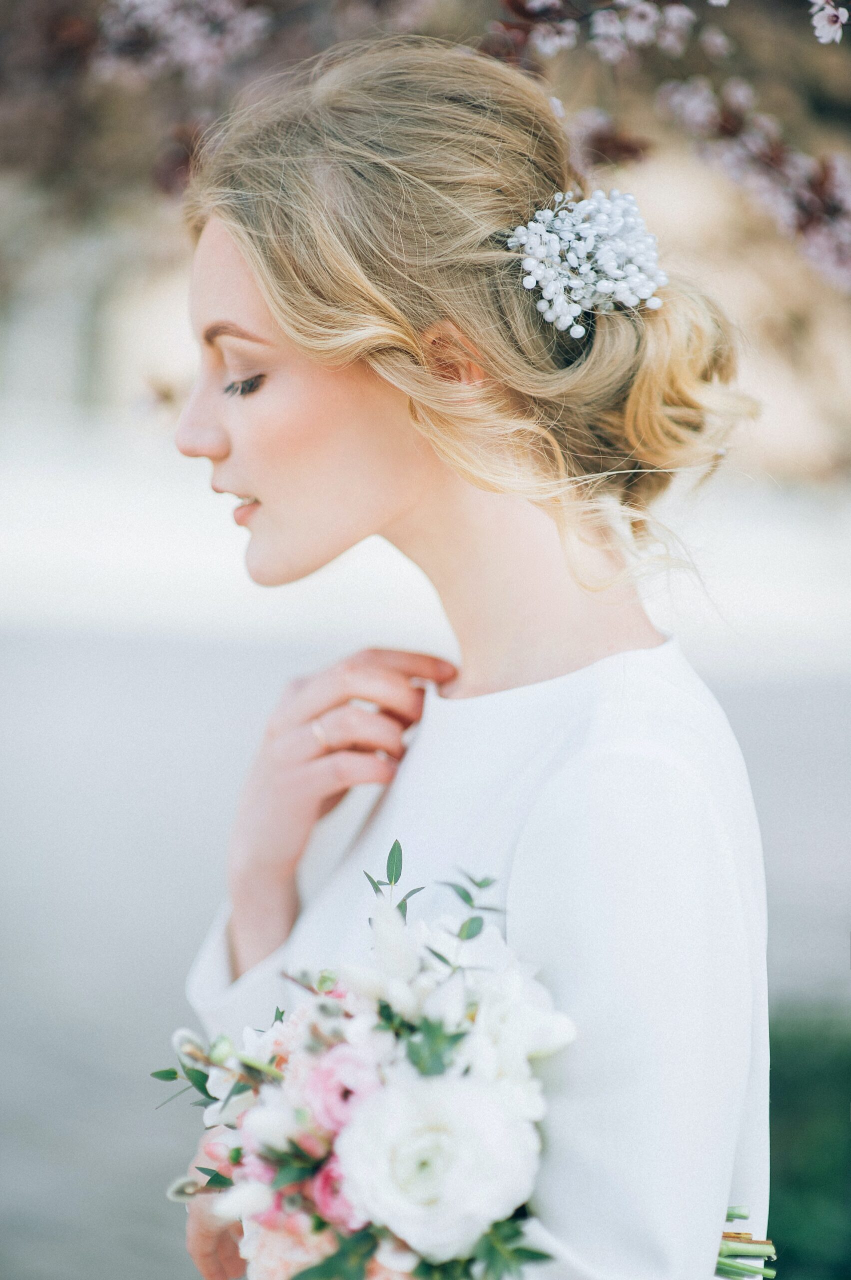 Bride with New hair style and Flowers Bouquet